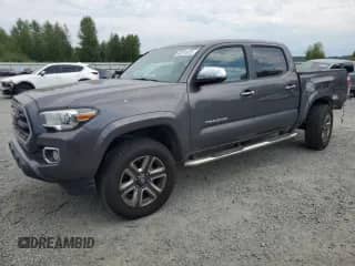 2016 Toyota Tacoma Limited z VIN 5TFGZ5AN9GX014041, wystawiony jako Copart lot #66916835 z przebiegiem 142 864 mil mil oraz Szkoda całkowita • Salvage title. Historia ofert i sprzedaży dostępna na DreamBid. Obrazek 1.