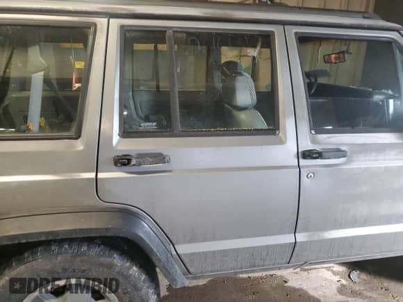 1992 Jeep Grand Cherokee with VIN 1J4FT88S5NL246158, listed as a Copart auction lot 87676655 with 1,418,563 mi miles and Salvage title. Bid and sale history available at DreamBid. Image 10.