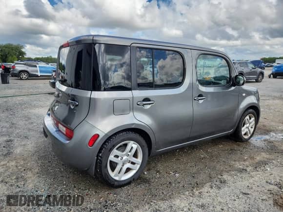 2012 Nissan Cube SL с VIN JN8AZ2KR1CT255393, выставлен на аукционе Copart как лот 64796925 с пробегом 115 582 миль миль и Списание • Salvage title. История ставок и продаж доступна на DreamBid. Изображение 3.