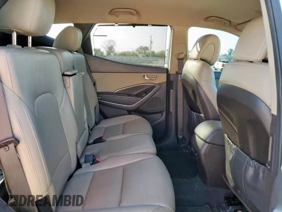 2015 Hyundai Santa Fe с VIN 5XYZU3LAXFG266131, выставлен на аукционе Copart как лот 70878385 с пробегом 98 363 миль миль и Списание • Salvage title. История ставок и продаж доступна на DreamBid. Изображение 11.