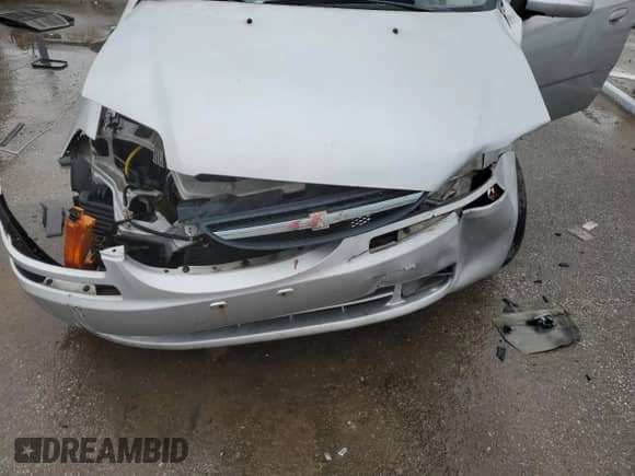 2006 Chevrolet Aveo LT с VIN KL1TG56606B652011, выставлен на аукционе Copart как лот 83815285 с пробегом Не указан миль и Списание • Salvage title. История ставок и продаж доступна на DreamBid. Изображение 11.
