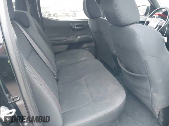 2017 Toyota Tacoma SR5 with VIN 3TMAZ5CN4HM047698, listed as a IAAI auction lot 42465382 with 132,297 mi miles and . Bid and sale history available at DreamBid. Image 8.