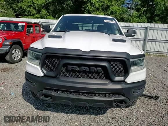 2022 Ram 1500 Rebel z VIN 1C6SRFLM2NN116060, wystawiony jako Copart lot #65881885 z przebiegiem 67 490 mil mil oraz Nie do naprawy • Non repairable. Historia ofert i sprzedaży dostępna na DreamBid. Obrazek 14.
