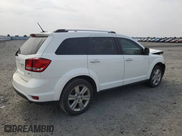 2016 Dodge Journey SXT with VIN 3C4PDCBB2GT104859, listed as a Copart auction lot 70313645 with 163,786 mi miles and Salvage title. Bid and sale history available at DreamBid. Image 3.