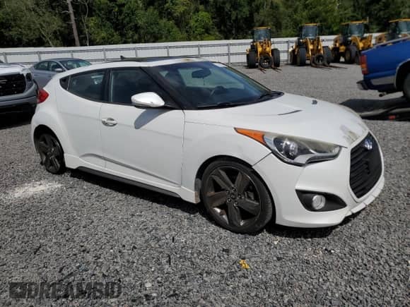 2015 Hyundai Veloster Turbo z VIN KMHTC6AE5FU225514, wystawiony jako Copart lot #71147595 z przebiegiem 136 771 mil mil oraz Szkoda całkowita • Salvage title. Historia ofert i sprzedaży dostępna na DreamBid. Obrazek 4.