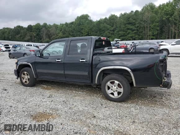 2012 Chevrolet Colorado 1LT z VIN 1GCDSCFE1C8103918, wystawiony jako Copart lot #69297865 z przebiegiem 244 894 mil mil oraz Szkoda całkowita • Salvage title. Historia ofert i sprzedaży dostępna na DreamBid. Obrazek 2.