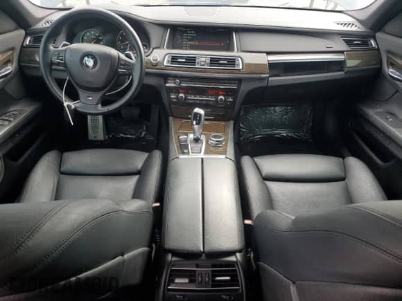 2014 BMW 7 Series 740i with VIN WBAYA6C51ED144289, listed as a Copart auction lot 82503675 with 77,375 mi miles and Clean title. Bid and sale history available at DreamBid. Image 8.