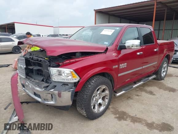 2014 Ram 1500 Laramie with VIN 1C6RR6NT5ES245222, listed as a IAAI auction lot 42134206 with 53,616 mi miles and . Bid and sale history available at DreamBid. Image 2.