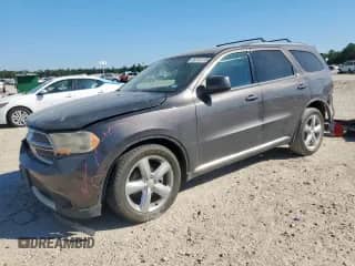 2013 Dodge Durango SXT with VIN 1C4RDHAG5DC699331, listed as a Copart auction lot 86268795 with 149,360 mi miles and Salvage title. Bid and sale history available at DreamBid. Image 1.