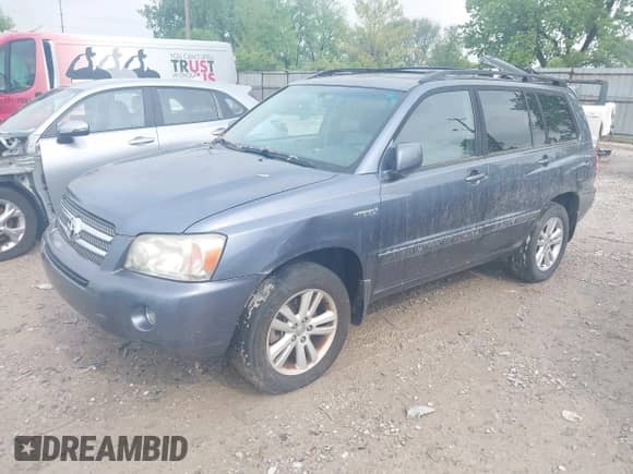 2007 Toyota Highlander with VIN JTEGW21AX70021363, listed as a IAAI auction lot 42217102 with 210,789 mi miles and . Bid and sale history available at DreamBid. Image 2.