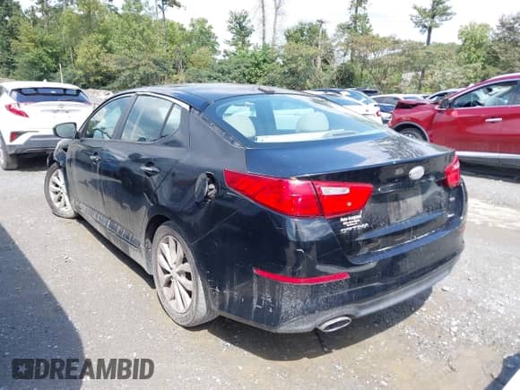 2014 Kia Optima LX with VIN 5XXGM4A76EG302498, listed as a IAAI auction lot 43129196 with 188,849 mi miles and . Bid and sale history available at DreamBid. Image 3.
