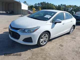 2019 Chevrolet Cruze LS z VIN 1G1BC5SM1K7101788, wystawiony jako IAAI lot #43360258 z przebiegiem 97 871 mil mil oraz . Historia ofert i sprzedaży dostępna na DreamBid. Obrazek 2.