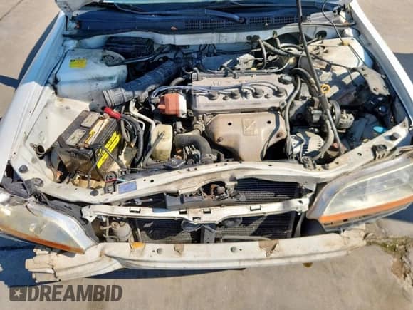 1999 Honda Accord LX z VIN 1HGCG5640XA121200, wystawiony jako Copart lot #70757615 z przebiegiem 240 754 mil mil oraz Szkoda całkowita • Salvage title. Historia ofert i sprzedaży dostępna na DreamBid. Obrazek 11.