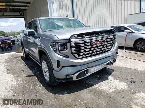 2023 GMC Sierra 1500 Denali z VIN 1GTUUGED7PZ270231, wystawiony jako Copart lot #58398935 z przebiegiem 14 572 mil mil oraz Nie do naprawy • Non repairable. Historia ofert i sprzedaży dostępna na DreamBid. Obrazek 13.