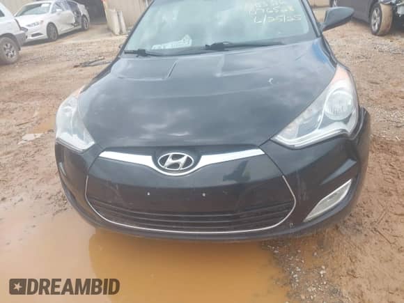 2012 Hyundai Veloster w/Red Int z VIN KMHTC6AD0CU076528, wystawiony jako IAAI lot #42651736 z przebiegiem 117 125 mil mil oraz . Historia ofert i sprzedaży dostępna na DreamBid. Obrazek 12.