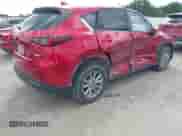 2023 Mazda CX-5 S Preferred z VIN JM3KFBCM8P0256180, wystawiony jako IAAI lot #42356779 z przebiegiem 50 994 mil mil oraz . Historia ofert i sprzedaży dostępna na DreamBid. Obrazek 4.