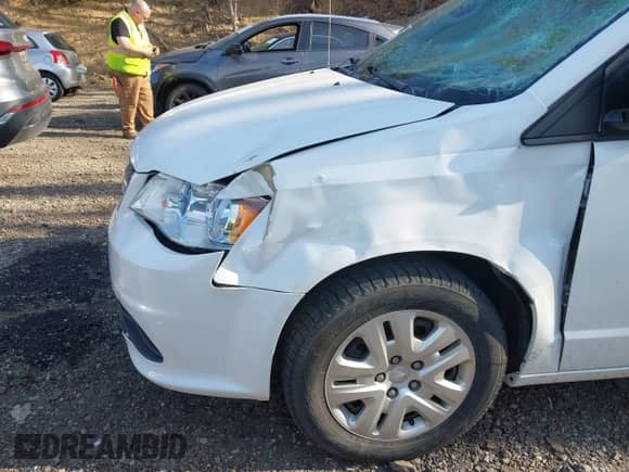 2019 Dodge Grand Caravan SE 35th Anniversary Edition with VIN 2C4RDGBG0KR741725, listed as a IAAI auction lot 42108294 with 48,448 mi miles and . Bid and sale history available at DreamBid. Image 12.