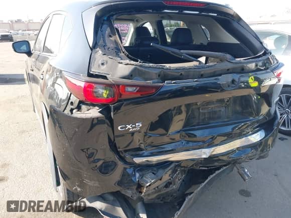 2022 Mazda CX-5 S Select z VIN JM3KFBBMXN0624955, wystawiony jako IAAI lot #43335876 z przebiegiem 77 689 mil mil oraz . Historia ofert i sprzedaży dostępna na DreamBid. Obrazek 6.