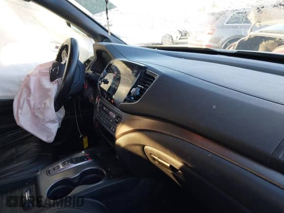 2022 Honda Passport EX-L with VIN 5FNYF8H5XNB020829, listed as a IAAI auction lot 41757349 with 20,456 mi miles and . Bid and sale history available at DreamBid. Image 5.