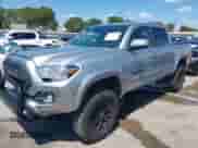2020 Toyota Tacoma TRD Sport with VIN 3TMAZ5CN6LM122538, listed as a IAAI auction lot 43128119 with 72,946 mi miles and . Bid and sale history available at DreamBid. Image 18.