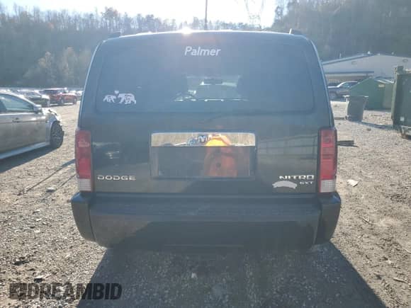 2011 Dodge Nitro SXT z VIN 1D4PU5GK5BW575754, wystawiony jako Copart lot #79841234 z przebiegiem 246 589 mil mil oraz Szkoda całkowita • Salvage title. Historia ofert i sprzedaży dostępna na DreamBid. Obrazek 6.