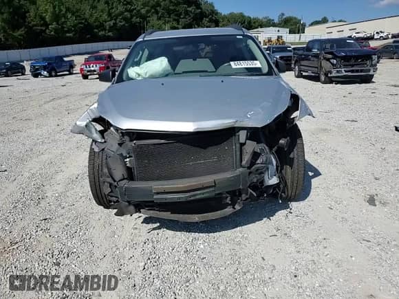 2012 Chevrolet Traverse LS с VIN 1GNKRFED0CJ157918, выставлен на аукционе Copart как лот 84815535 с пробегом Не указан миль и Списание • Salvage title. История ставок и продаж доступна на DreamBid. Изображение 14.
