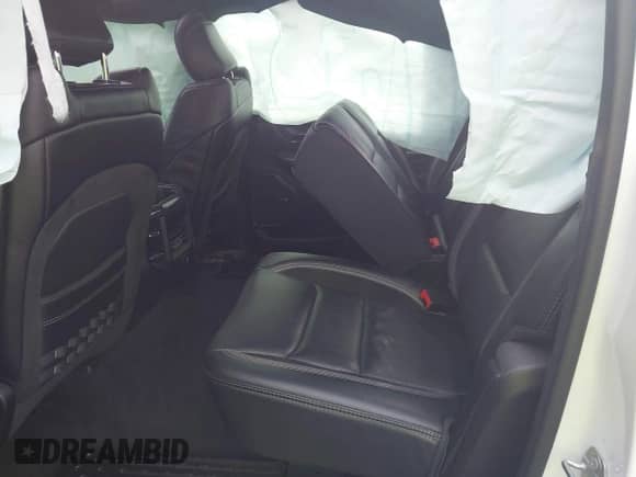 2021 Ram 1500 TRX with VIN 1C6SRFU95MN904579, listed as a IAAI auction lot 42354576 with 76,897 mi miles and . Bid and sale history available at DreamBid. Image 8.