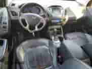 2014 Hyundai Tucson Walking Dead Edition z VIN KM8JUCAG1EU939644, wystawiony jako Copart lot #65899175 z przebiegiem 171 118 mil mil oraz Szkoda całkowita • Salvage title. Historia ofert i sprzedaży dostępna na DreamBid. Obrazek 8.