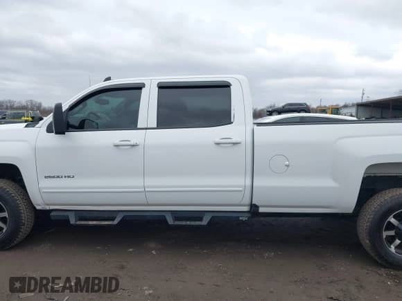 2015 Chevrolet Silverado 2500HD LT z VIN 1GC1KVEG6FF617734, wystawiony jako IAAI lot #41721265 z przebiegiem 165 445 mil mil oraz . Historia ofert i sprzedaży dostępna na DreamBid. Obrazek 14.