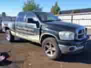 2007 Dodge 1500 SLT with VIN 1D7HU18257S156462, listed as a IAAI auction lot 43374096 with 254,921 mi miles and . Bid and sale history available at DreamBid. Image 1.