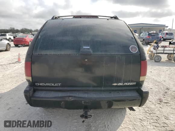 1995 Chevrolet Blazer LS с VIN 1GNCS18WXSK252374, выставлен на аукционе Copart как лот 45168065 с пробегом 291 772 миль миль и На запчасти • Non repairable. История ставок и продаж доступна на DreamBid. Изображение 6.