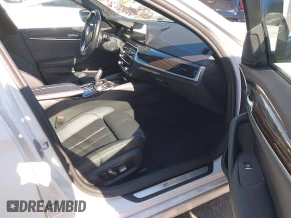 2018 BMW 5 Series 530e with VIN WBAJA9C55JB251175, listed as a IAAI auction lot 42893216 with 53,623 mi miles and . Bid and sale history available at DreamBid. Image 5.