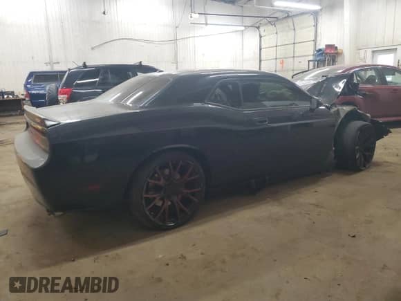 2008 Dodge Challenger SRT-8 z VIN 2B3LJ74W18H300866, wystawiony jako Copart lot #49029855 z przebiegiem Nie podano mil oraz Szkoda całkowita • Salvage title. Historia ofert i sprzedaży dostępna na DreamBid. Obrazek 3.