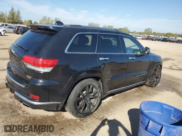 2014 Jeep Grand Cherokee Summit with VIN 1C4RJFJT0EC559604, listed as a Copart auction lot 82201225 with 276,073 mi miles and Clean title. Bid and sale history available at DreamBid. Image 3.