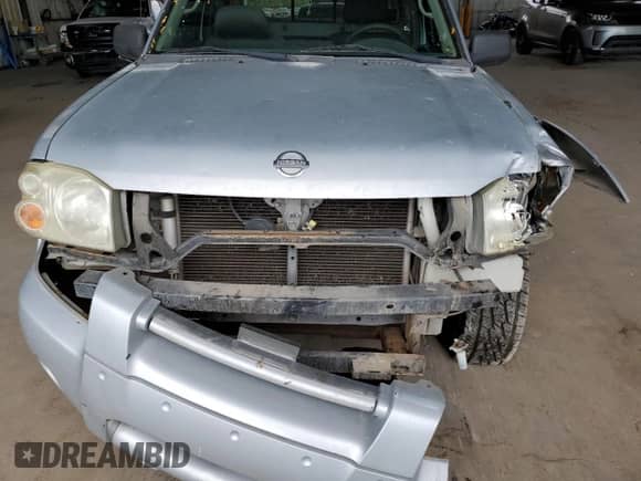 2003 Nissan Frontier XE z VIN 1N6ED26T73C412407, wystawiony jako Copart lot #68175205 z przebiegiem Nie podano mil oraz Szkoda całkowita • Salvage title. Historia ofert i sprzedaży dostępna na DreamBid. Obrazek 11.