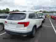 2017 Honda Pilot EX-L with VIN 5FNYF5H50HB002326, listed as a IAAI auction lot 42356845 with 101,098 mi miles and . Bid and sale history available at DreamBid. Image 4.