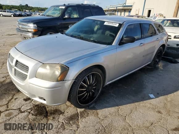 2006 Dodge Magnum with VIN 2D4FV47T16H122652, listed as a Copart auction lot 73688634 with 213,985 mi miles and Salvage title. Bid and sale history available at DreamBid. Image 1.
