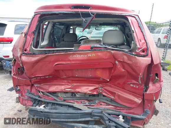 2005 Dodge Caravan SXT with VIN 1D4GP45R05B104057, listed as a IAAI auction lot 42330306 with 185,469 mi miles and . Bid and sale history available at DreamBid. Image 6.