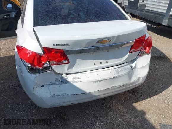 2013 Chevrolet Cruze LS z VIN 1G1PA5SG7D7240624, wystawiony jako IAAI lot #42783412 z przebiegiem 149 482 mil mil oraz . Historia ofert i sprzedaży dostępna na DreamBid. Obrazek 6.