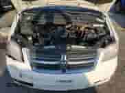 2009 Dodge Grand Caravan SXT with VIN 2D8HN54109R663416, listed as a Copart auction lot 78124154 with 158,243 mi miles and Salvage title. Bid and sale history available at DreamBid. Image 12.
