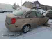 2004 Chevrolet Optra с VIN KL1JD52Z44K944399, выставлен на аукционе Copart как лот 83368844 с пробегом Не указан миль и Списание • Salvage title. История ставок и продаж доступна на DreamBid. Изображение 3.