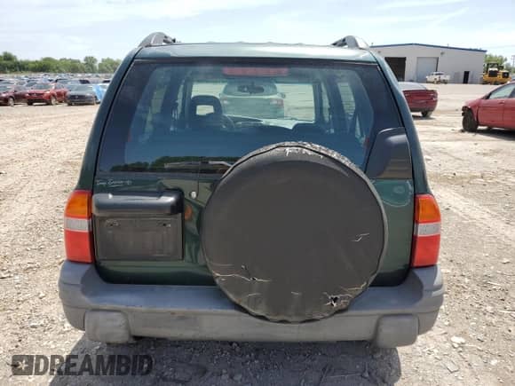 2003 Chevrolet Tracker с VIN 2CNBJ13C836948719, выставлен на аукционе Copart как лот 61665644 с пробегом Не указан миль и Чистый • Clean title. История ставок и продаж доступна на DreamBid. Изображение 6.