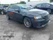 2013 Chrysler 300 C John Varvatos Limited Edition with VIN 2C3CCADG1DH727364, listed as a IAAI auction lot 42242027 with 90,247 mi miles and . Bid and sale history available at DreamBid. Image 1.