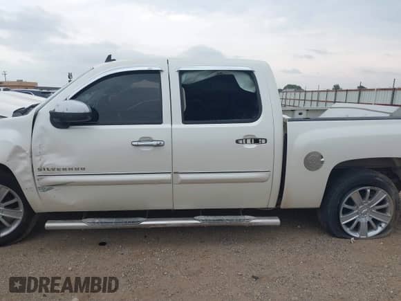 2012 Chevrolet Silverado 1500 LT with VIN 3GCPCSE04CG146542, listed as a IAAI auction lot 43160134 with 189,402 mi miles and . Bid and sale history available at DreamBid. Image 14.