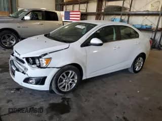 2014 Chevrolet Sonic LT с VIN 1G1JC5SH8E4135442, выставлен на аукционе Copart как лот 81111945 с пробегом 127 320 миль миль и Списание • Salvage title. История ставок и продаж доступна на DreamBid. Изображение 1.