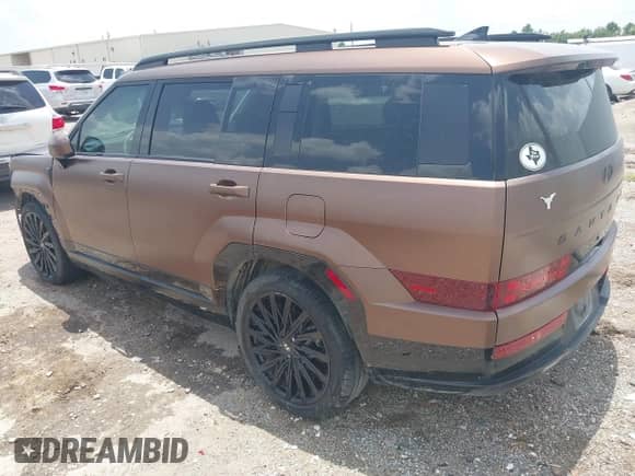 2024 Hyundai Santa Fe Calligraphy z VIN 5NMP54GLXRH030997, wystawiony jako IAAI lot #42754702 z przebiegiem 27 740 mil mil oraz . Historia ofert i sprzedaży dostępna na DreamBid. Obrazek 3.