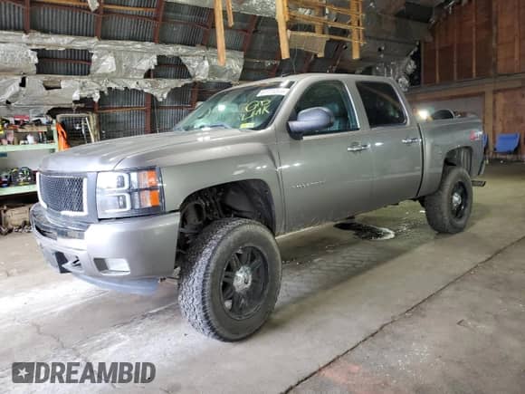 2013 Chevrolet Silverado 1500 LTZ z VIN 3GCPKTE77DG278332, wystawiony jako Copart lot #61771285 z przebiegiem 196 743 mil mil oraz Szkoda całkowita • Salvage title. Historia ofert i sprzedaży dostępna na DreamBid. Obrazek 1.