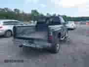 1999 Dodge 1500 with VIN 1B7HF13Z8XJ650068, listed as a IAAI auction lot 43007449 with 201,630 mi miles and . Bid and sale history available at DreamBid. Image 4.