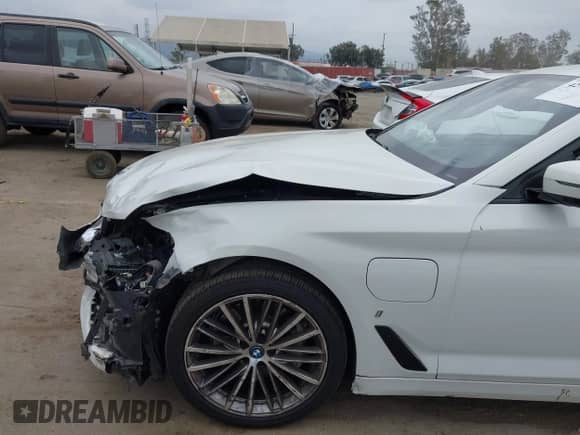 2018 BMW 5 Series 530e with VIN WBAJA9C58JB034140, listed as a IAAI auction lot 42778931 with 98,059 mi miles and . Bid and sale history available at DreamBid. Image 6.