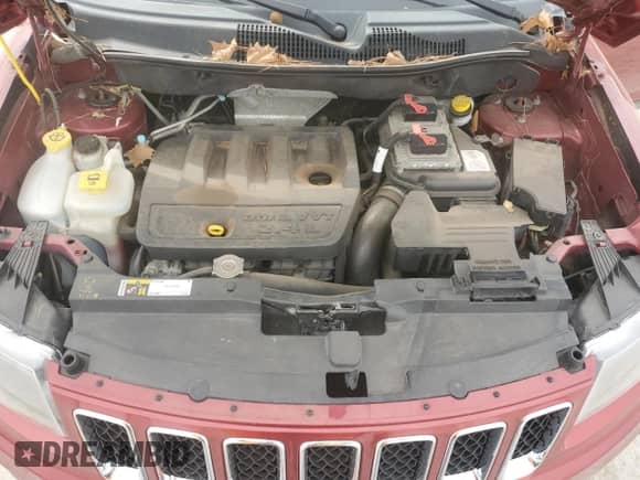 2014 Jeep Compass Sport z VIN 1C4NJCBB0ED865621, wystawiony jako Copart lot #52941835 z przebiegiem 93 487 mil mil oraz Szkoda całkowita • Salvage title. Historia ofert i sprzedaży dostępna na DreamBid. Obrazek 12.